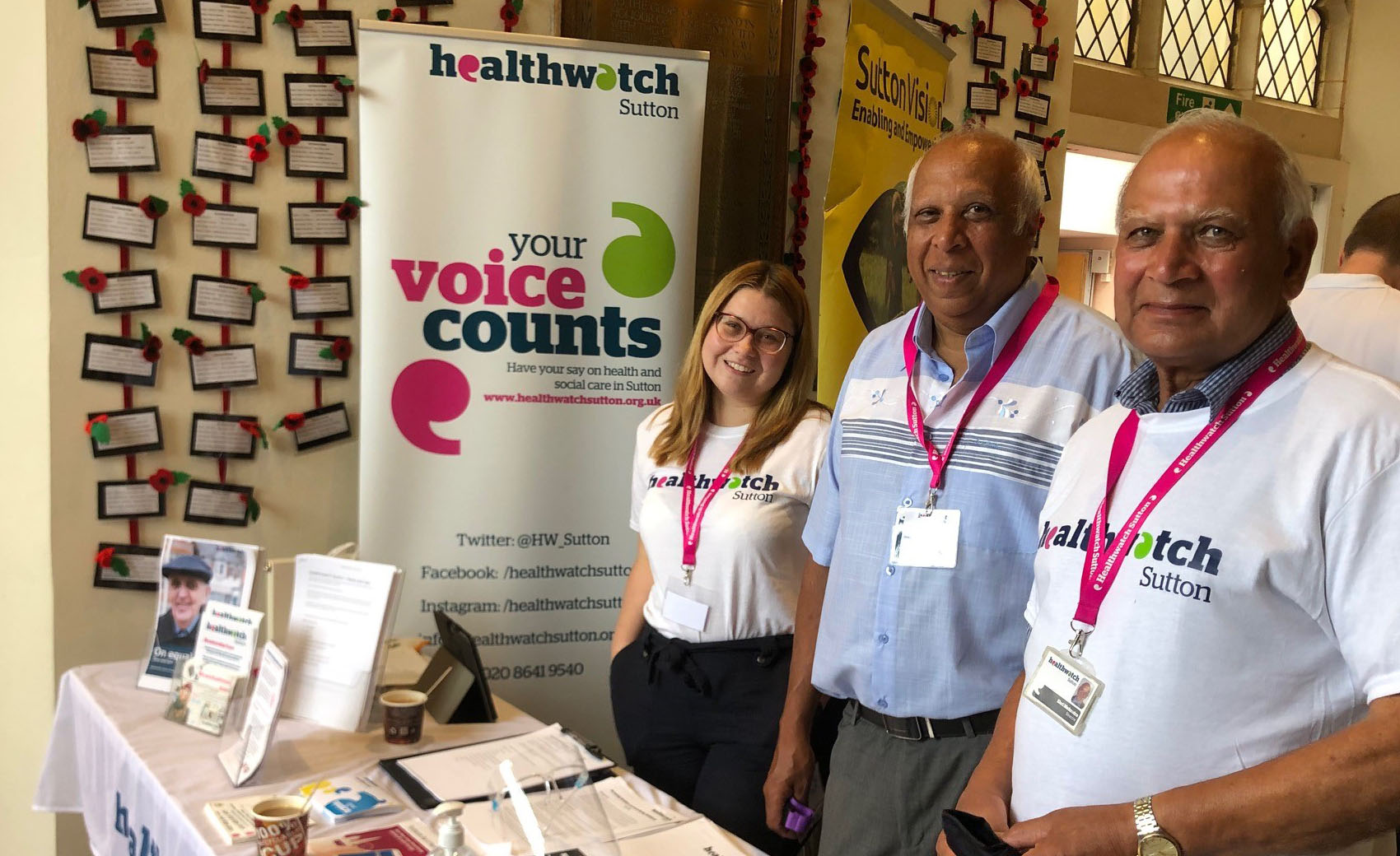 Healthwatch stall with staff and volunteers
