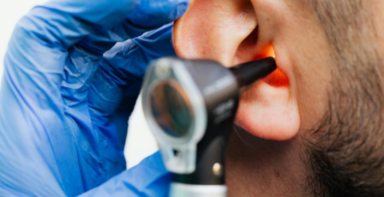 Image of someone having an ear examination